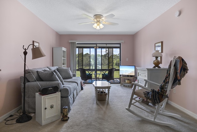 4215 Gator Trace Ave Unit I, Fort Pierce, FL 34950 - living room featuring carpet flooring, a ceiling fan, and a textured ceiling