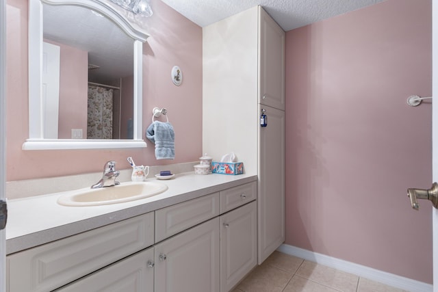 4215 Gator Trace Ave Unit I, Fort Pierce, FL 34950 - full bathroom featuring vanity, tile patterned floors, and a textured ceiling