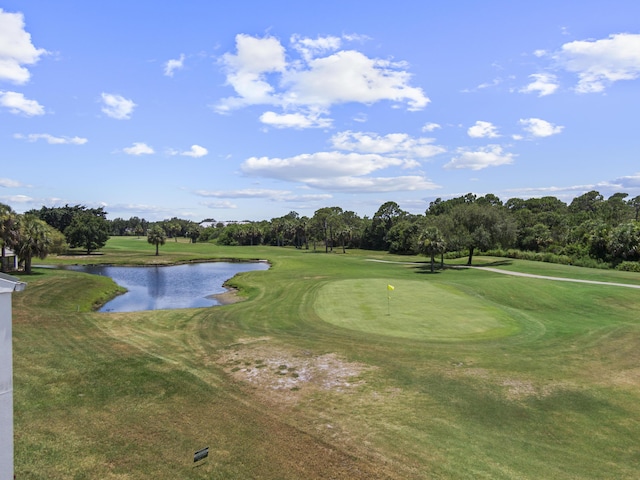 4215 Gator Trace Ave Unit I, Fort Pierce, FL 34950 - view of property's community with a water view, golf course view, view of wooded area, and a lawn