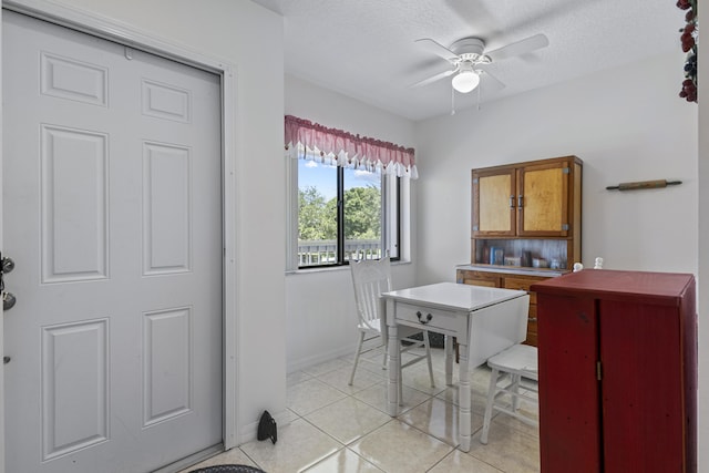 4215 Gator Trace Ave Unit I, Fort Pierce, FL 34950 - office featuring ceiling fan, light tile patterned floors, and a textured ceiling