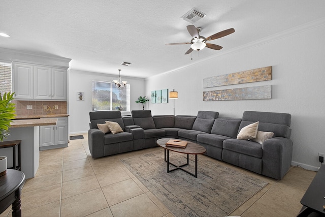 3004 N Evergreen Cir, Boynton Beach, FL 33426 - living area with a chandelier, a ceiling fan, light tile patterned floors, ornamental molding, and a textured ceiling