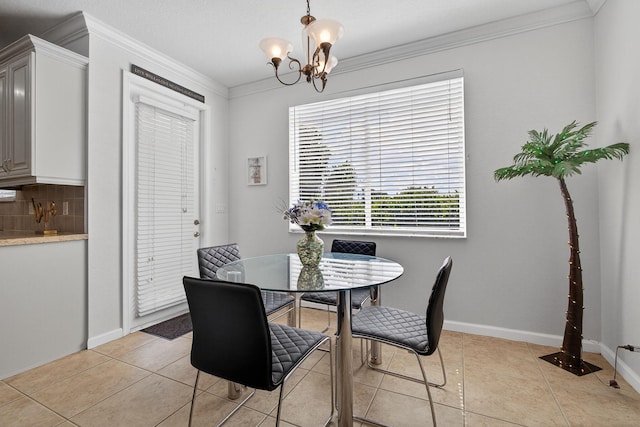 3004 N Evergreen Cir, Boynton Beach, FL 33426 - dining room with ornamental molding, a chandelier, and light tile patterned floors
