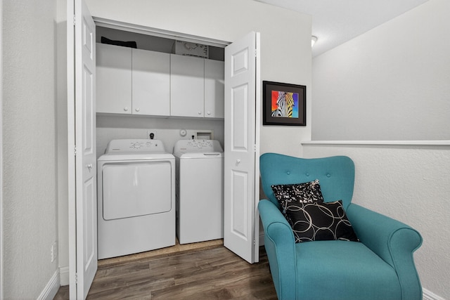 3004 N Evergreen Cir, Boynton Beach, FL 33426 - laundry area with cabinet space, dark wood-style floors, and washing machine and dryer
