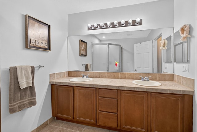 3004 N Evergreen Cir, Boynton Beach, FL 33426 - full bathroom featuring double vanity, a stall shower, and tile patterned floors