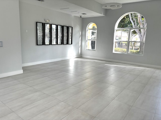 3004 N Evergreen Cir, Boynton Beach, FL 33426 - unfurnished room featuring baseboards and tile patterned floors