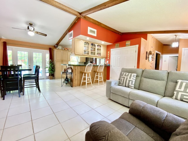 16651 96th Ter N, Jupiter, FL 33478 - living room featuring light tile patterned flooring and ceiling fan