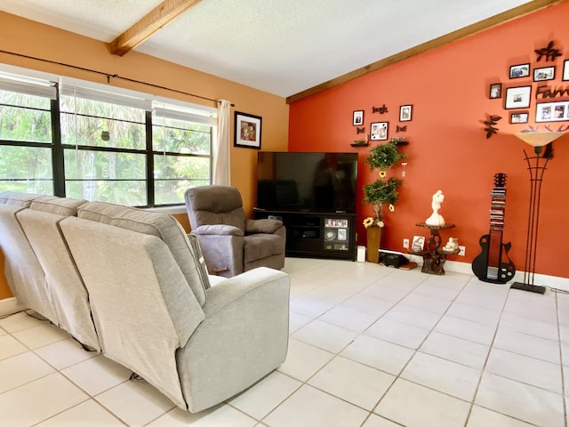16651 96th Ter N, Jupiter, FL 33478 - living room with light tile patterned floors and a textured ceiling