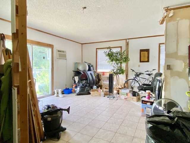 16651 96th Ter N, Jupiter, FL 33478 - tiled empty room featuring healthy amount of natural light, an AC wall unit, ornamental molding, and a textured ceiling