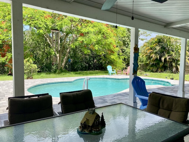 16651 96th Ter N, Jupiter, FL 33478 - outdoor pool featuring a ceiling fan and a patio area