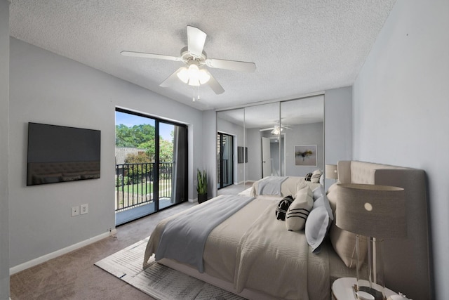 2897 SW 22nd Cir Unit 44B, Delray Beach, FL 33445 - bedroom featuring access to outside, carpet flooring, a textured ceiling, ceiling fan, and a closet