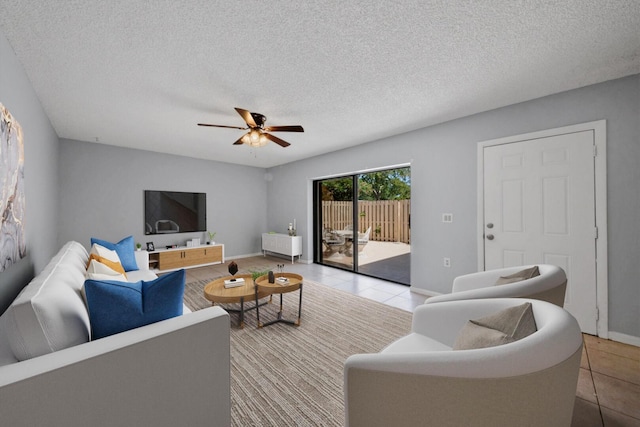 2897 SW 22nd Cir Unit 44B, Delray Beach, FL 33445 - tiled living area with ceiling fan and a textured ceiling