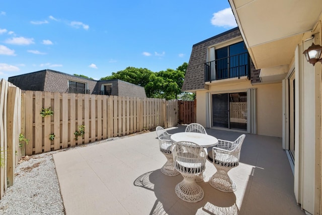 2897 SW 22nd Cir Unit 44B, Delray Beach, FL 33445 - patio / terrace with a patio area, outdoor dining space, and a fenced backyard