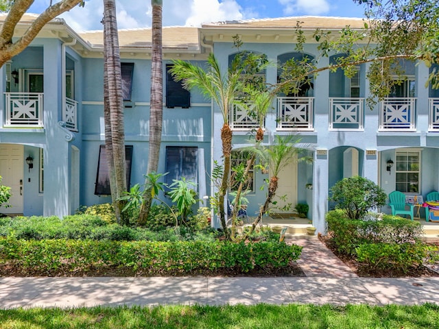 3032 W Community Dr, Jupiter, FL 33458 - view of front facade featuring stucco siding