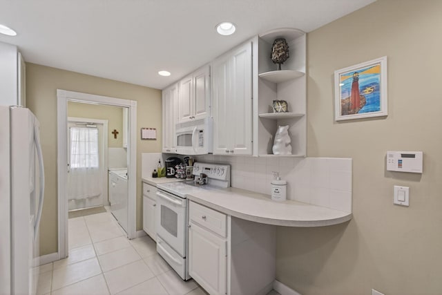 3032 W Community Dr, Jupiter, FL 33458 - kitchen featuring white appliances, white cabinets, light countertops, tasteful backsplash, and recessed lighting