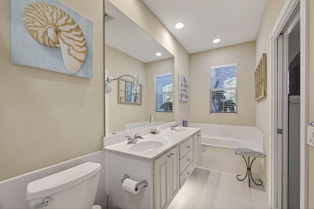 3032 W Community Dr, Jupiter, FL 33458 - full bathroom featuring a bath, double vanity, tile patterned floors, and recessed lighting