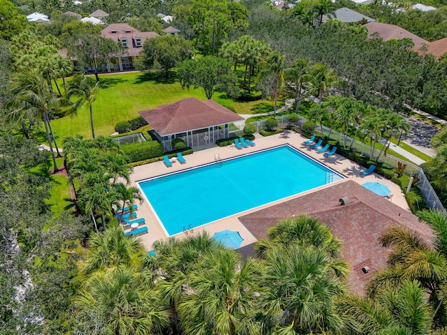 3032 W Community Dr, Jupiter, FL 33458 - community pool featuring view of wooded area