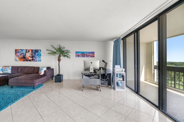 2400 Presidential Way Unit 903, West Palm Beach, FL 33401 - living room with light tile patterned floors, a textured ceiling, and a desk