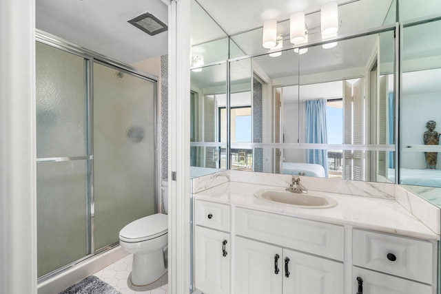 2400 Presidential Way Unit 903, West Palm Beach, FL 33401 - full bath featuring a shower stall, vanity, and tile patterned flooring