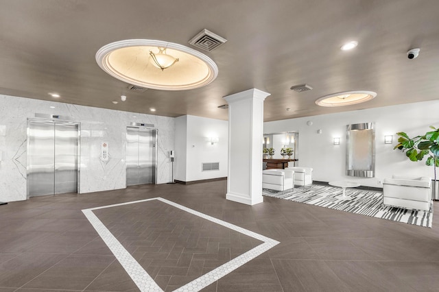 2400 Presidential Way Unit 903, West Palm Beach, FL 33401 - common area featuring a security system and recessed lighting