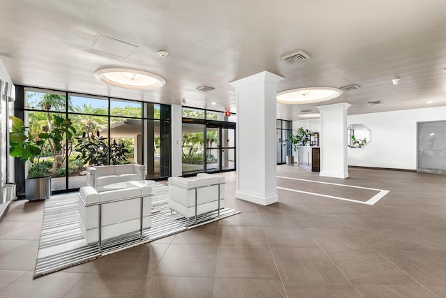 2400 Presidential Way Unit 903, West Palm Beach, FL 33401 - community lobby with a wall of windows