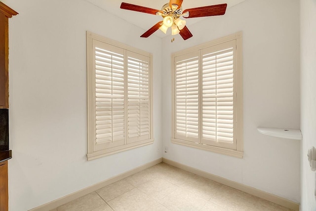 2619 SW Greenwich Way, Palm City, FL 34990 - empty room with a ceiling fan and baseboards