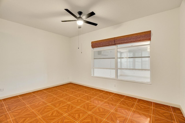 2619 SW Greenwich Way, Palm City, FL 34990 - unfurnished room with a ceiling fan and baseboards