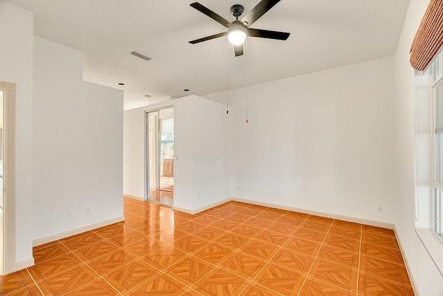 2619 SW Greenwich Way, Palm City, FL 34990 - unfurnished room with a ceiling fan and baseboards