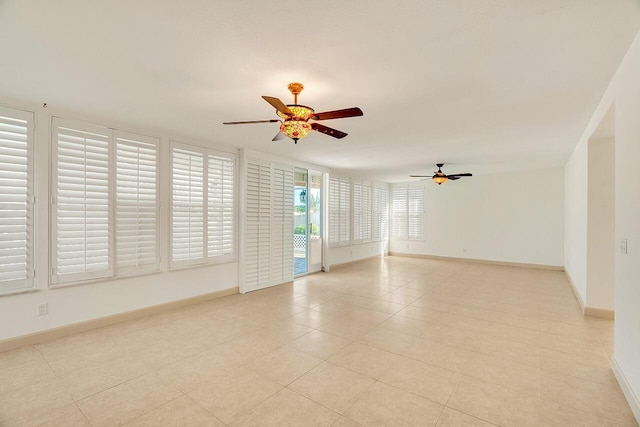 2619 SW Greenwich Way, Palm City, FL 34990 - spare room featuring a ceiling fan and light tile patterned floors
