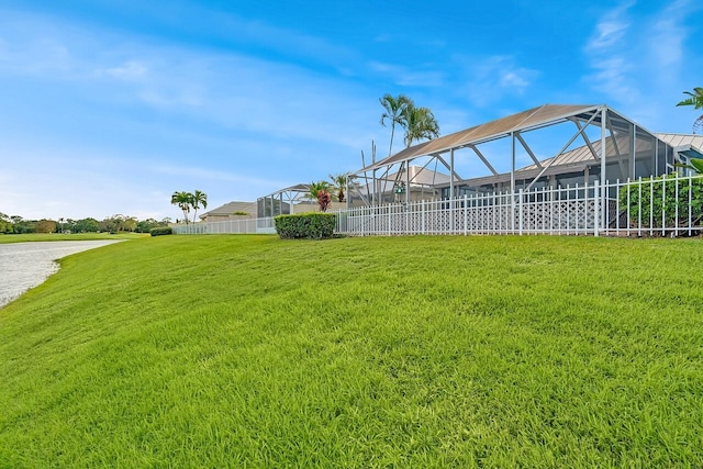 2619 SW Greenwich Way, Palm City, FL 34990 - view of yard featuring a water view and glass enclosure