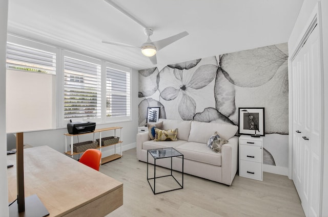 930 Dogwood Dr Unit 358, Delray Beach, FL 33483 - living room with wood finished floors, ceiling fan, and a desk