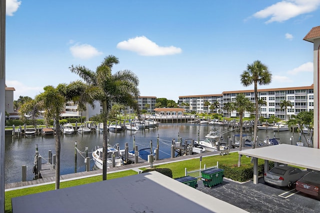 930 Dogwood Dr Unit 358, Delray Beach, FL 33483 - balcony featuring boat lift, a boat dock, and a water view