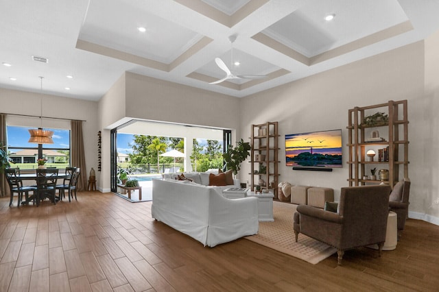 9109 Balsamo Dr, Palm Beach Gardens, FL 33412 - living area with a towering ceiling, wood finished floors, ceiling fan, beamed ceiling, and coffered ceiling