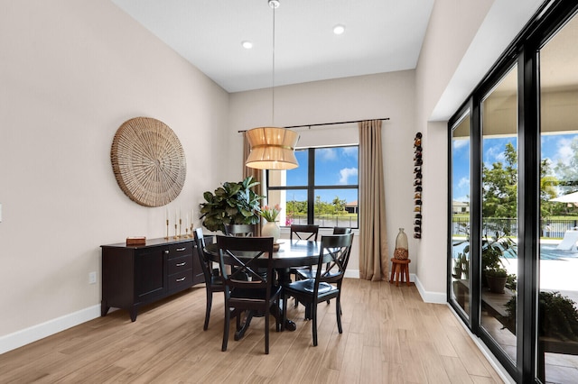 9109 Balsamo Dr, Palm Beach Gardens, FL 33412 - dining space with light wood-type flooring and recessed lighting