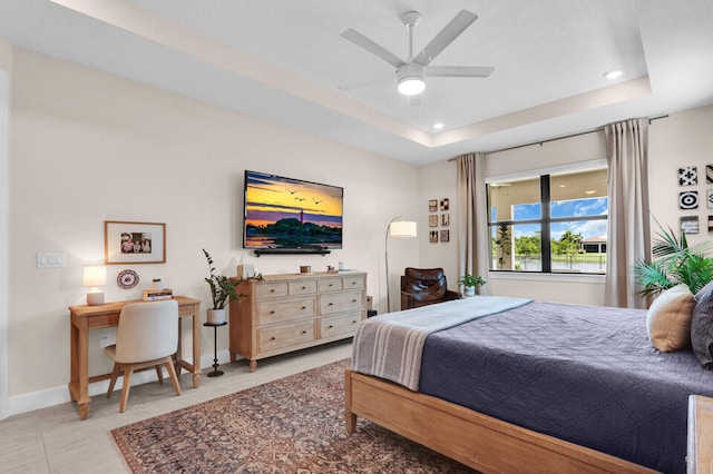 9109 Balsamo Dr, Palm Beach Gardens, FL 33412 - bedroom featuring a raised ceiling, recessed lighting, and ceiling fan