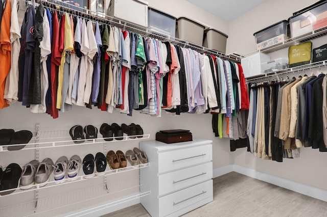 9109 Balsamo Dr, Palm Beach Gardens, FL 33412 - walk in closet with tile patterned flooring