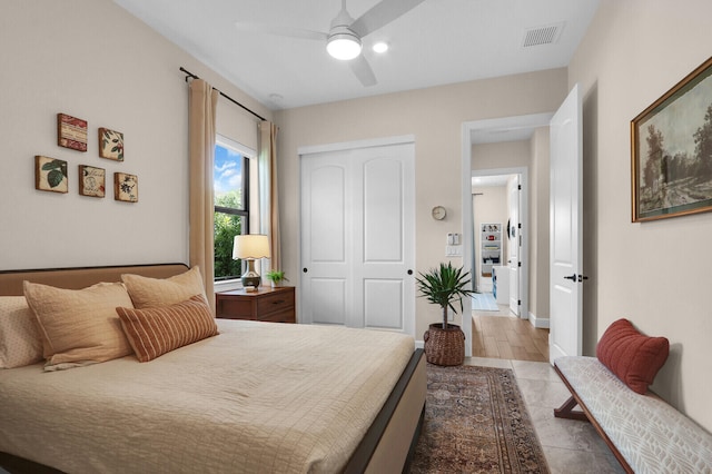 9109 Balsamo Dr, Palm Beach Gardens, FL 33412 - bedroom featuring a closet, tile patterned floors, and a ceiling fan