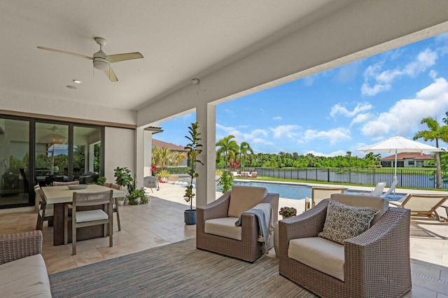 9109 Balsamo Dr, Palm Beach Gardens, FL 33412 - view of patio with a ceiling fan, outdoor dining area, and a water view
