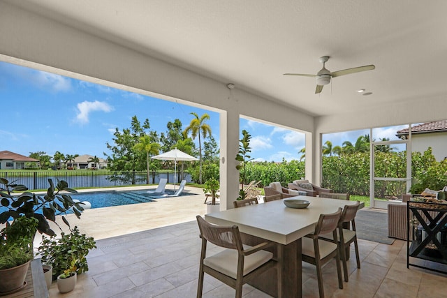9109 Balsamo Dr, Palm Beach Gardens, FL 33412 - view of patio / terrace featuring ceiling fan, outdoor dining space, and a water view