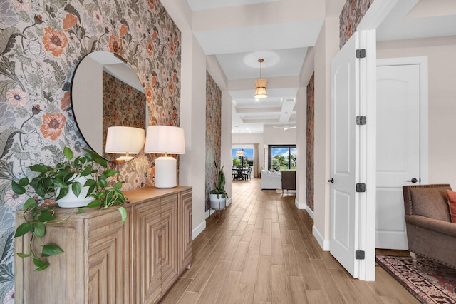 9109 Balsamo Dr, Palm Beach Gardens, FL 33412 - hallway with baseboards and light wood finished floors