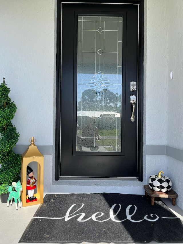 209 SW Christmas Ter, Port Saint Lucie, FL 34984 - entrance to property with stucco siding