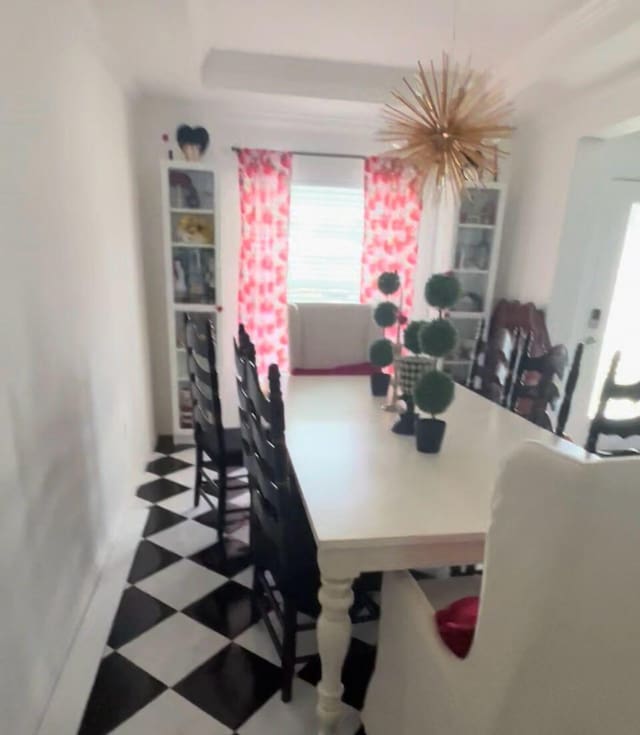 209 SW Christmas Ter, Port Saint Lucie, FL 34984 - dining area with healthy amount of natural light and tile patterned floors