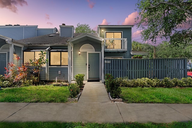 1864 Adventure Pl Unit 1864, North Lauderdale, FL 33068 - view of front facade featuring a balcony and a chimney