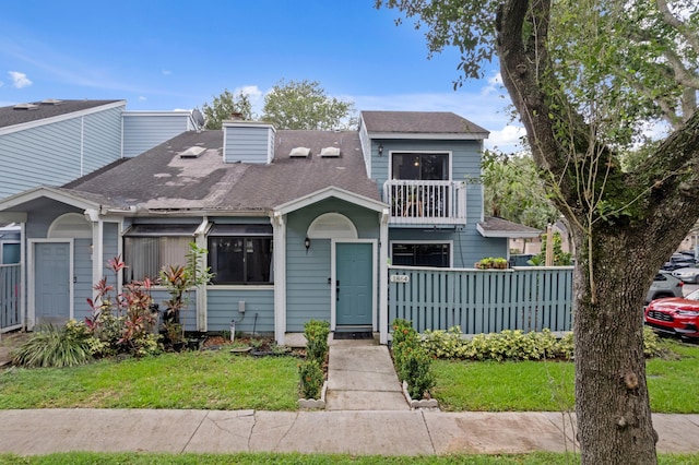 1864 Adventure Pl Unit 1864, North Lauderdale, FL 33068 - multi unit property featuring a balcony, a shingled roof, and a chimney