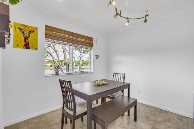 866 NW 92nd Ave, Plantation, FL 33324 - dining area with crown molding and light tile patterned flooring