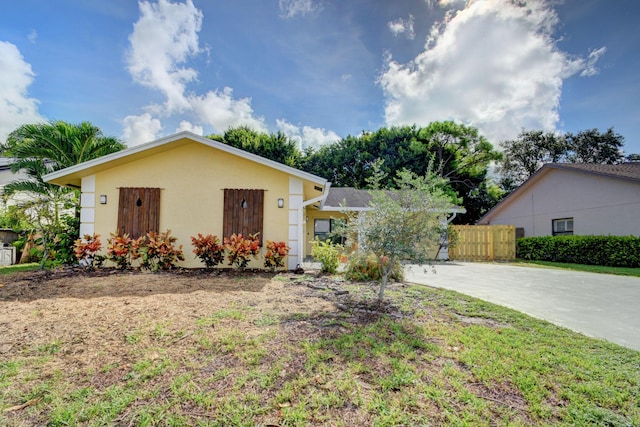 6170 Serene Run, Lake Worth, FL 33463 - single story home with stucco siding and driveway