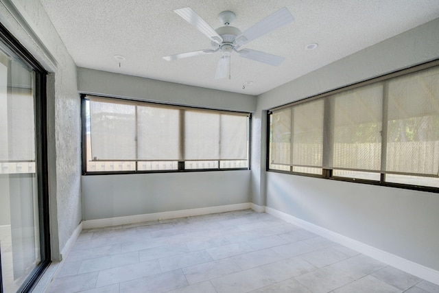 6170 Serene Run, Lake Worth, FL 33463 - unfurnished sunroom with a ceiling fan