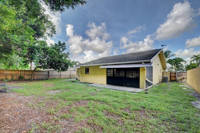 6170 Serene Run, Lake Worth, FL 33463 - rear view of property with stucco siding, a fenced backyard, and a shingled roof