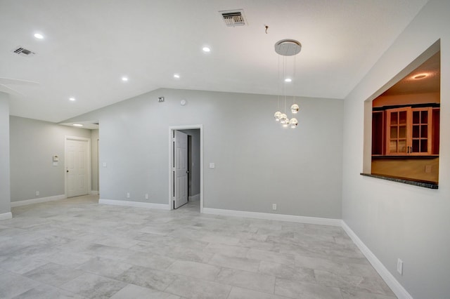 6170 Serene Run, Lake Worth, FL 33463 - unfurnished room featuring lofted ceiling, a chandelier, and recessed lighting
