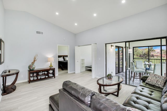 1102 Republic Ct, Deerfield Beach, FL 33442 - living area with high vaulted ceiling, light wood-style flooring, and recessed lighting