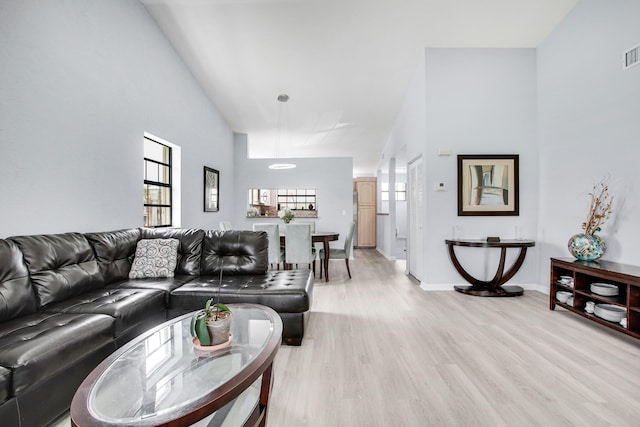 1102 Republic Ct, Deerfield Beach, FL 33442 - living area with light wood-style floors and a towering ceiling